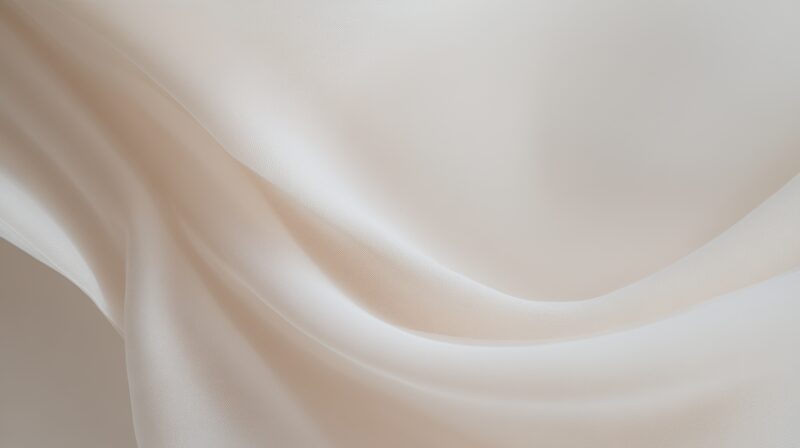 Luxurious satin fabric with smooth, flowing folds for an elegant aesthetic.