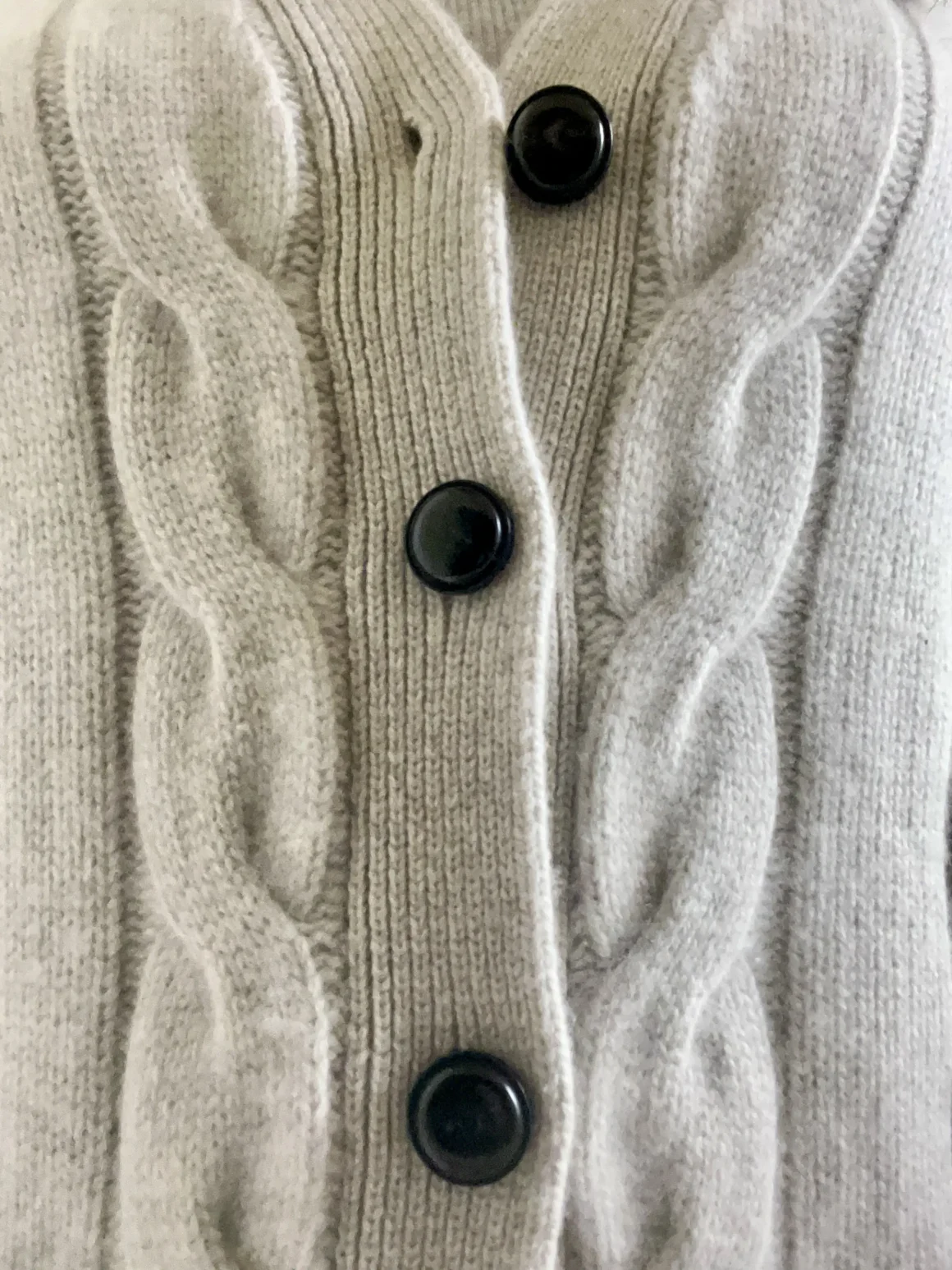 This Quince cashmere cardigan has a history--the buttons have been replaced with real horn shank buttons.